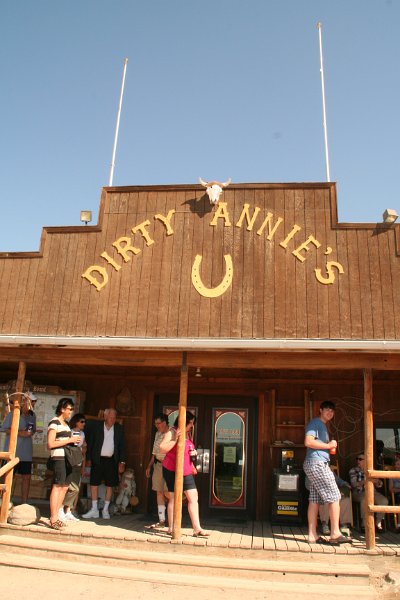 Trip (202).JPG - Kris on the porch of "Dirty Annie's" country store in Shell, Wyoming
